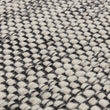 Teppich Kolong in Eierschale & Schwarz aus 100% Schurwolle | Entdecken Sie unsere schönsten Wohnaccessoires