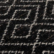 Teppich Amini in Schwarz & Eierschale aus 100% Schurwolle | Entdecken Sie unsere schönsten Wohnaccessoires